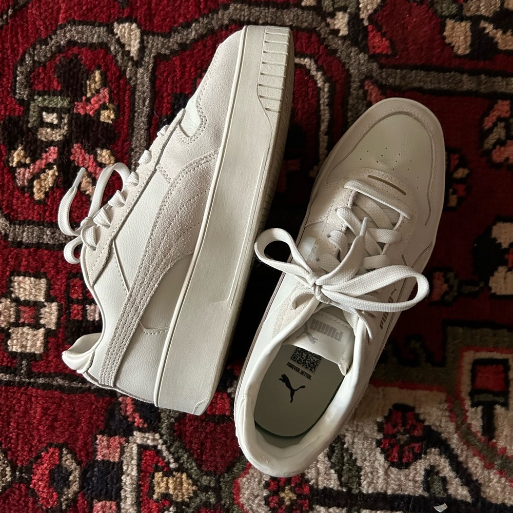 Puma carina platform sneakers in off white cream